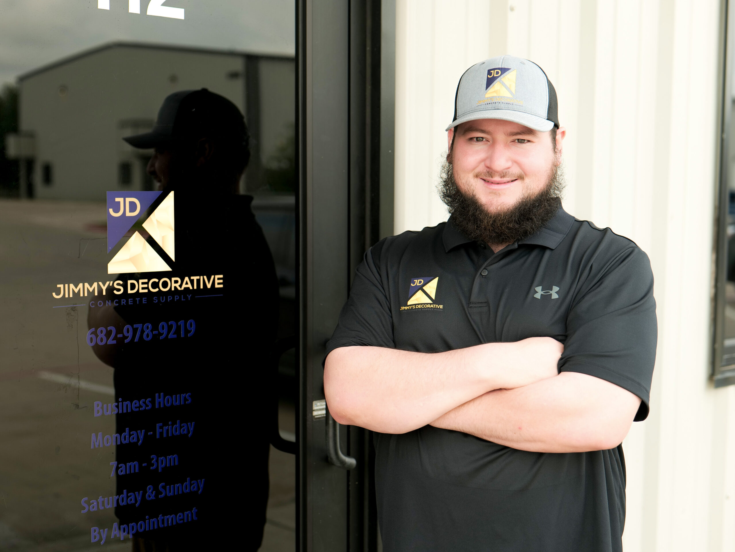 1 Jimmy in front of the entrance of Jimmys Decorative Concrete Supply